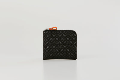 HISOKA New Seven Treasures coin purse in black leather with zipper closure and patterned exterior