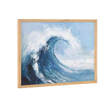 Framed abstract painting of a blue ocean wave cresting with white foam against a soft sky-blue background in a light wood frame.