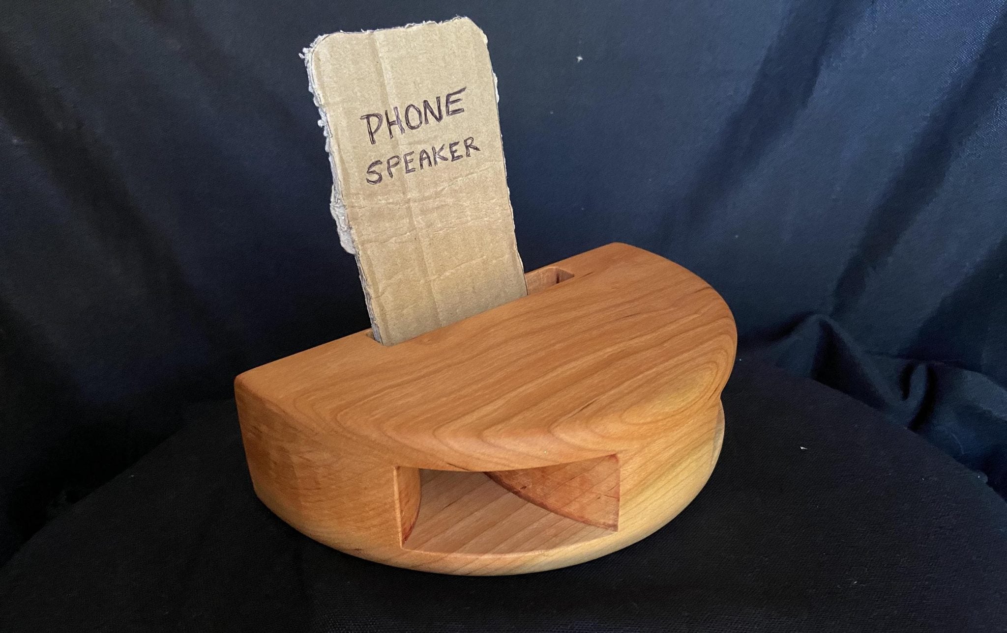 Handmade wooden smartphone speaker amplifier in Cherry, White Oak, and Mahogany finishes