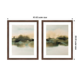 Two framed watercolor prints with abstract landscapes in soft green, beige, and black tones, measuring 43 by 26 inches each, arranged side by side.