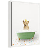 Framed canvas of Sylvie Lion Cub in green bathtub on colored tile by Amy Peterson