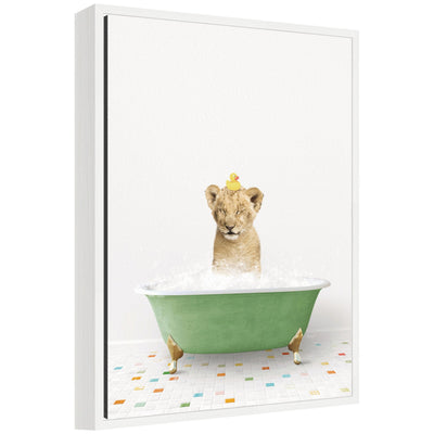 Framed canvas of Sylvie Lion Cub in green bathtub on colored tile by Amy Peterson