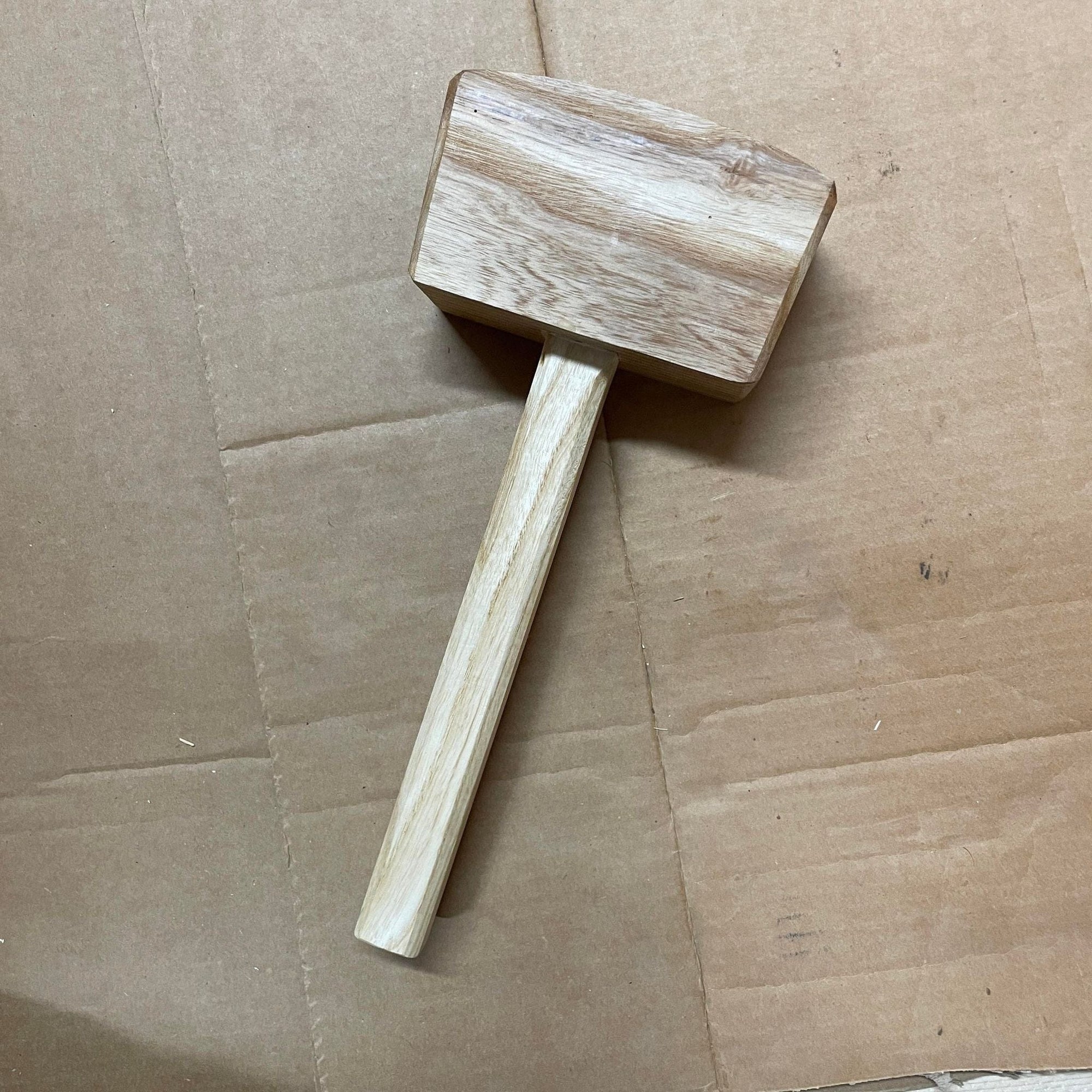Handmade ash wooden carpenter's mallet with oiled finish