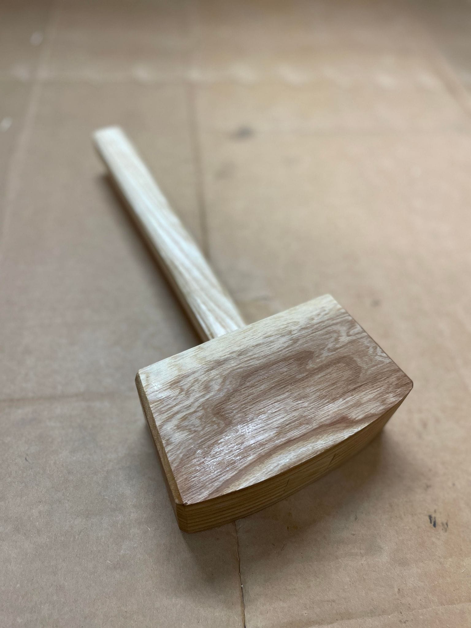 Handmade ash wooden carpenter's mallet with oiled finish