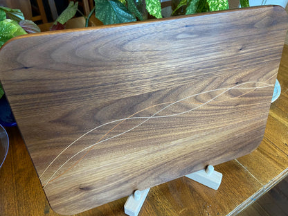 Handcrafted Walnut charcuterie board with Cherry and Maple decorative banding