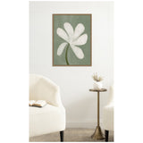 Minimalist framed canvas of a white flower with six petals on a muted green background, hung above a brass side table with a round white vase and two cream armchairs.