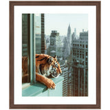 Framed artwork titled Urban Tiger Overlooking Manhattan featuring a tiger at a high-rise window with city skyscrapers beyond
