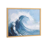 Abstract painting of a large blue ocean wave with white splashes, framed in light wood, set against a pale blue sky background.