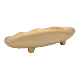 Oval decorative tray with a textured gold finish and gently uneven edges, elevated on two short rounded legs, shown on a white background.