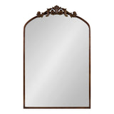 Rectangular mirror with a rounded arch top and dark wood frame featuring ornate floral and scroll carving at the center of the arch.