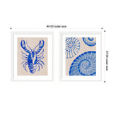 Two framed prints feature blue watercolor marine subjects: a lobster with detailed claws and a shell with spiral patterns on beige backgrounds.