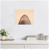 Framed canvas print of a retro surfboard tip with a brown and beige minimalist background, hanging above a white desk with books and decorative containers.