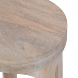 Close-up of a round wooden table top with smooth edges and subtle wood grain patterns in light brown tones.