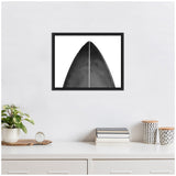 Abstract minimalist artwork featuring the top section of a black surfboard with a subtle textured gradient, divided symmetrically by a thin white line in a black frame.