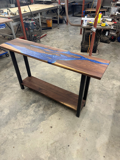 Walnut river console table made with black walnut slabs and blue ocean epoxy
