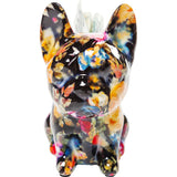 Glossy dog-shaped money box featuring a vibrant pattern of multicolored flower-like shapes on a dark background, viewed from the front with a slot on top.