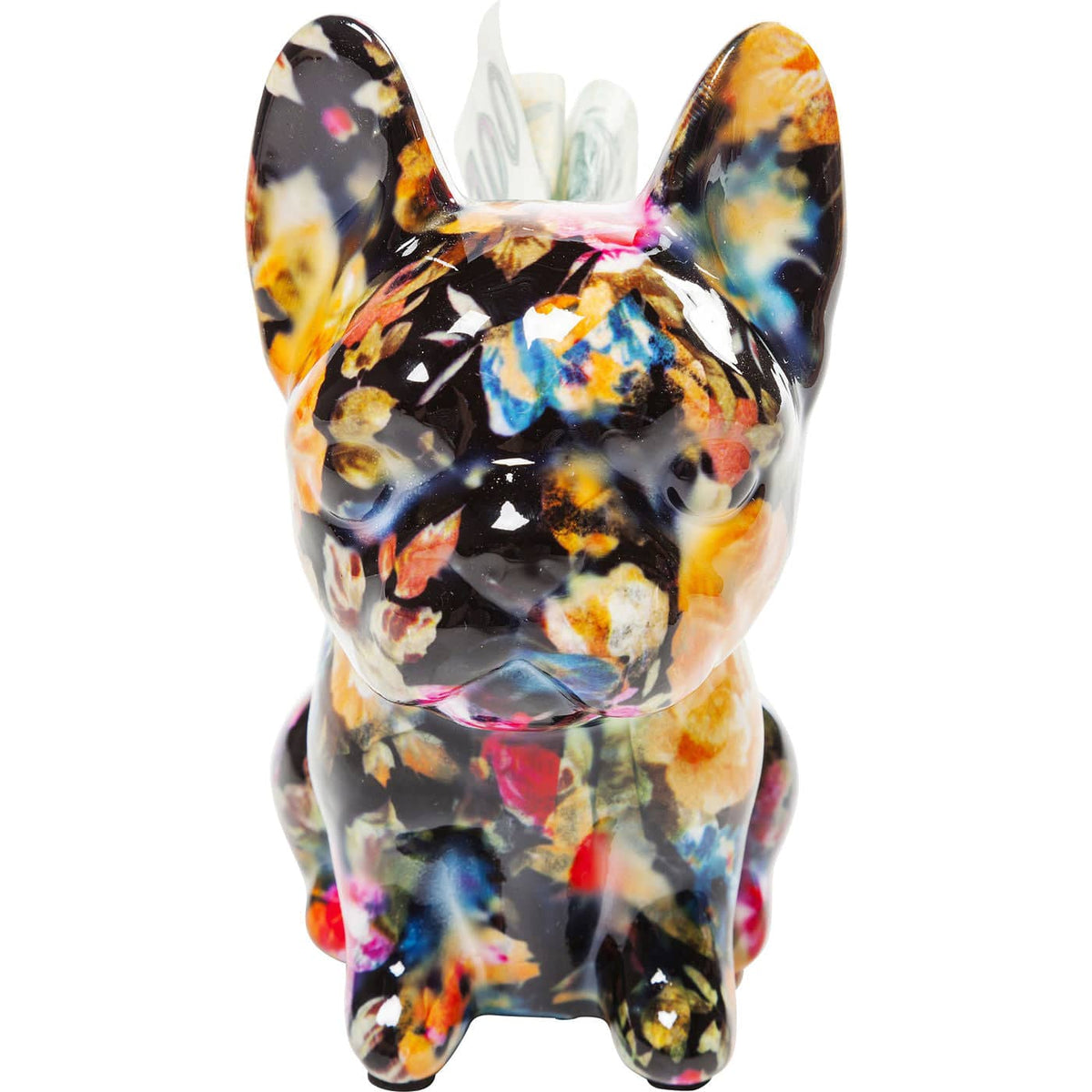 Glossy dog-shaped money box featuring a vibrant pattern of multicolored flower-like shapes on a dark background, viewed from the front with a slot on top.