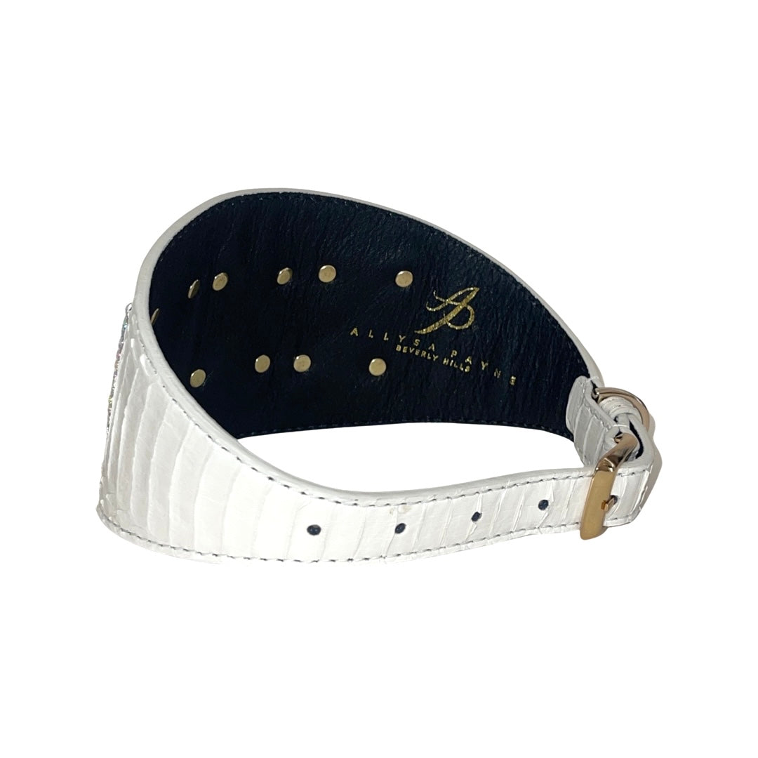 Matte white snake-patterned leather collar with a 4-inch width and multiple gold-tone rivet holes, featuring a gold buckle and black interior lining.