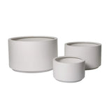 Three smooth, matte light gray cylindrical planters in small, medium, and large sizes, arranged side by side on a white background.