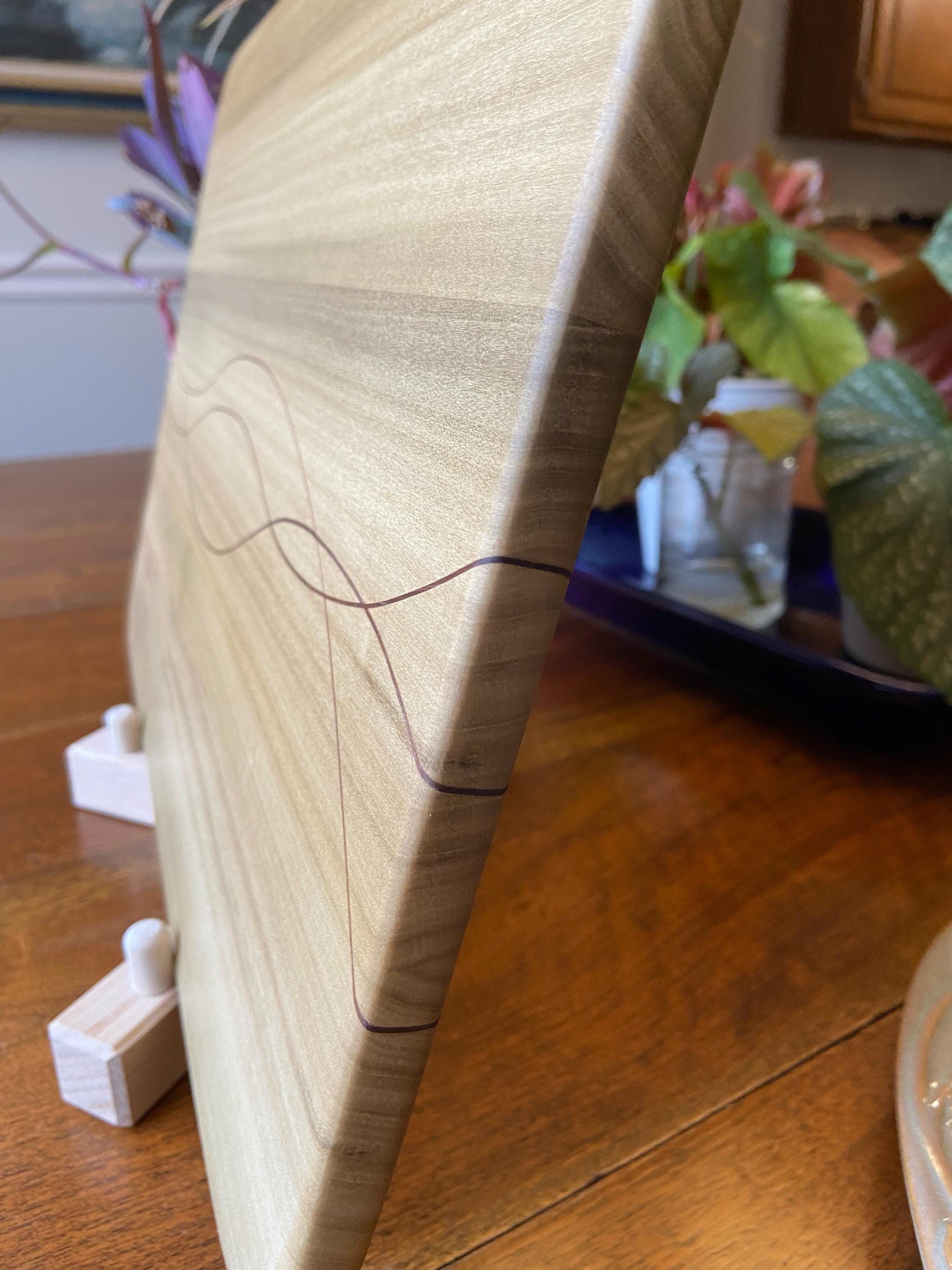 Handcrafted solid Poplar charcuterie board with Peruvian Walnut banding and inlay