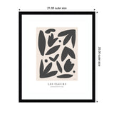 Abstract black botanical shapes arranged on a beige background with 'Les Fleurs' title and 'Exposition d'Art' subtitle, framed in a black 21x25-inch frame.