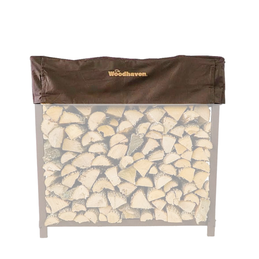 Woodhaven Short Firewood Rack Seasoning Cover in black on a firewood rack