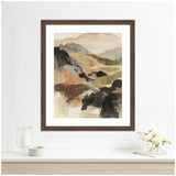 Abstract landscape painting with layered, muted earth tones including browns, greens, and grays, framed in dark wood and hung above a minimal mantel with flowers and a candle.