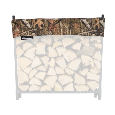 Woodhaven Short Firewood Rack Seasoning Cover in black on a firewood rack