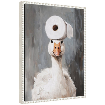 Framed canvas art showing Sylvie the goose holding a toilet paper roll with a vintage beaded frame