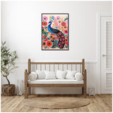 Wall art above a wooden bench with white cushions shows a colorful boho-style peacock surrounded by red and pink flowers with green leaves on a light background.