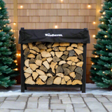 Woodhaven 3 ft Firewood Rack with seasoning cover in black finish holding stacked firewood