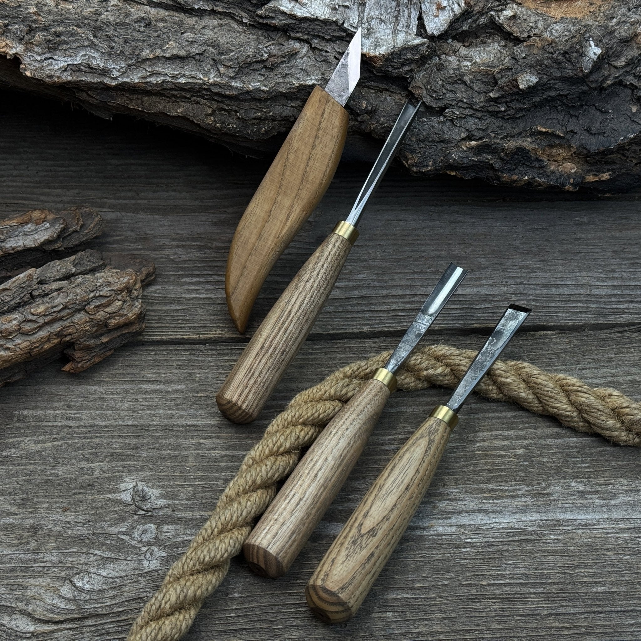 4-piece hand-forged wood carving tool set with ash wood handles and steel blades