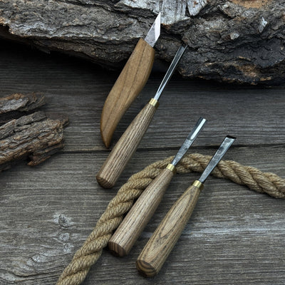 4-piece hand-forged wood carving tool set with ash wood handles and steel blades