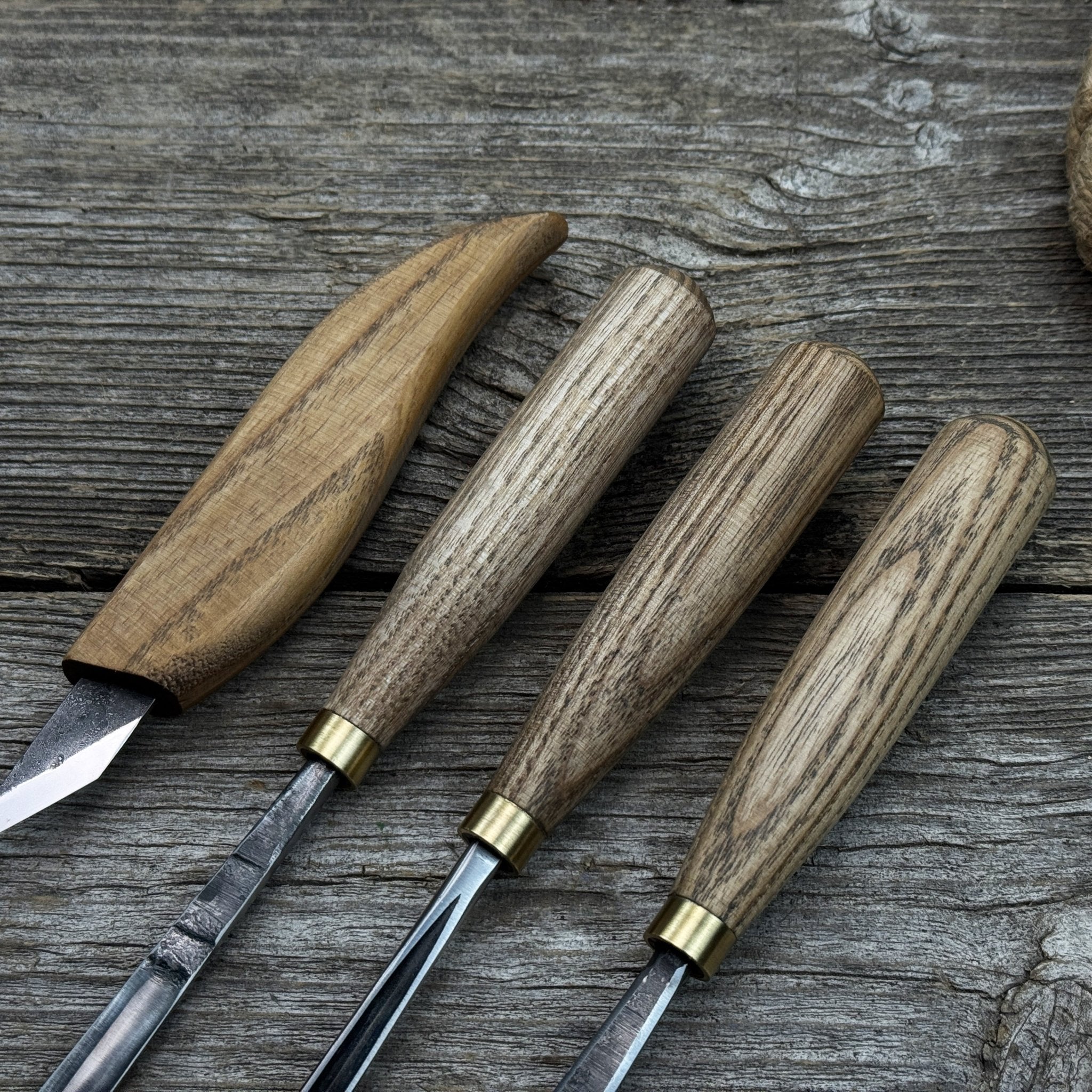 4-piece hand-forged wood carving tool set with ash wood handles and steel blades