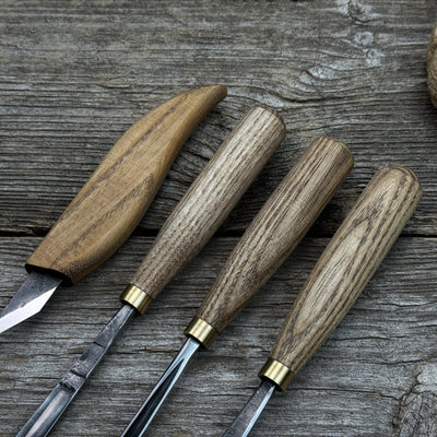 4-piece hand-forged wood carving tool set with ash wood handles and steel blades