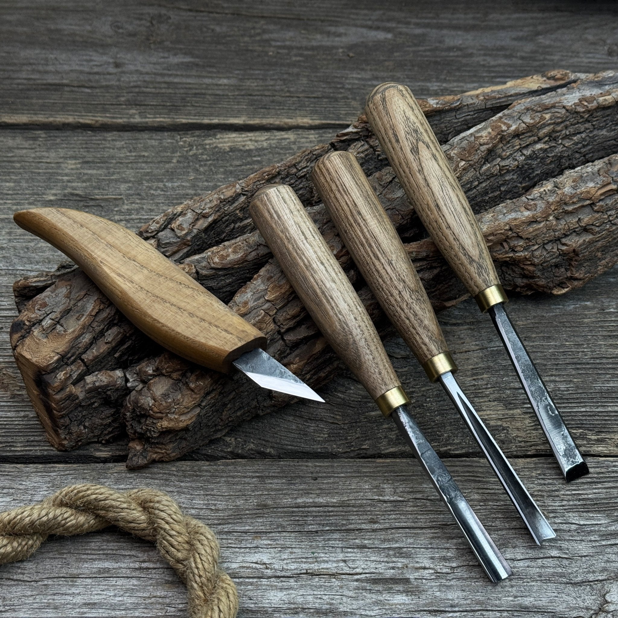 4-piece hand-forged wood carving tool set with ash wood handles and steel blades