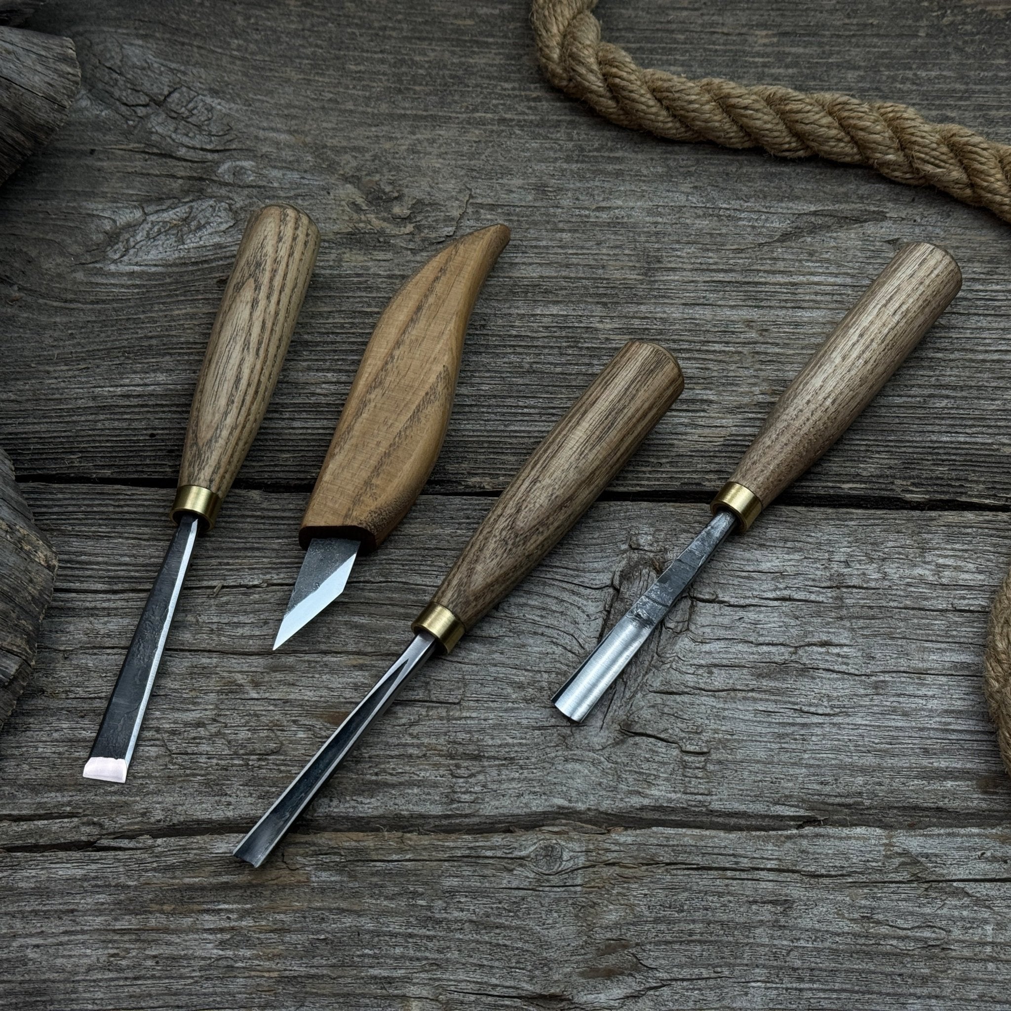 4-piece hand-forged wood carving tool set with ash wood handles and steel blades