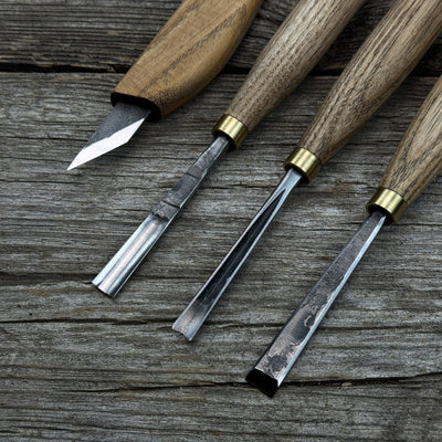 4-piece hand-forged wood carving tool set with ash wood handles and steel blades