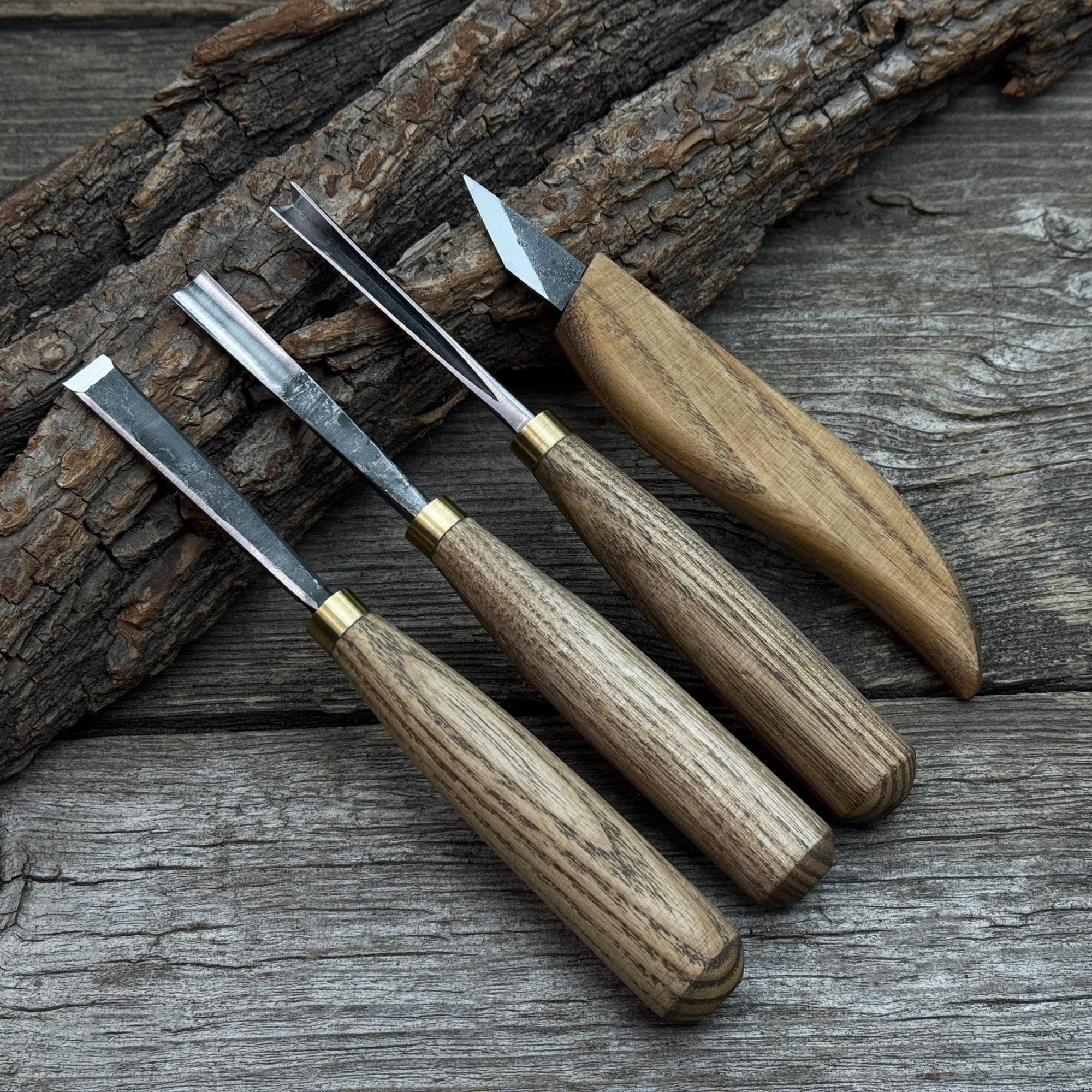 4-piece hand-forged wood carving tool set with ash wood handles and steel blades
