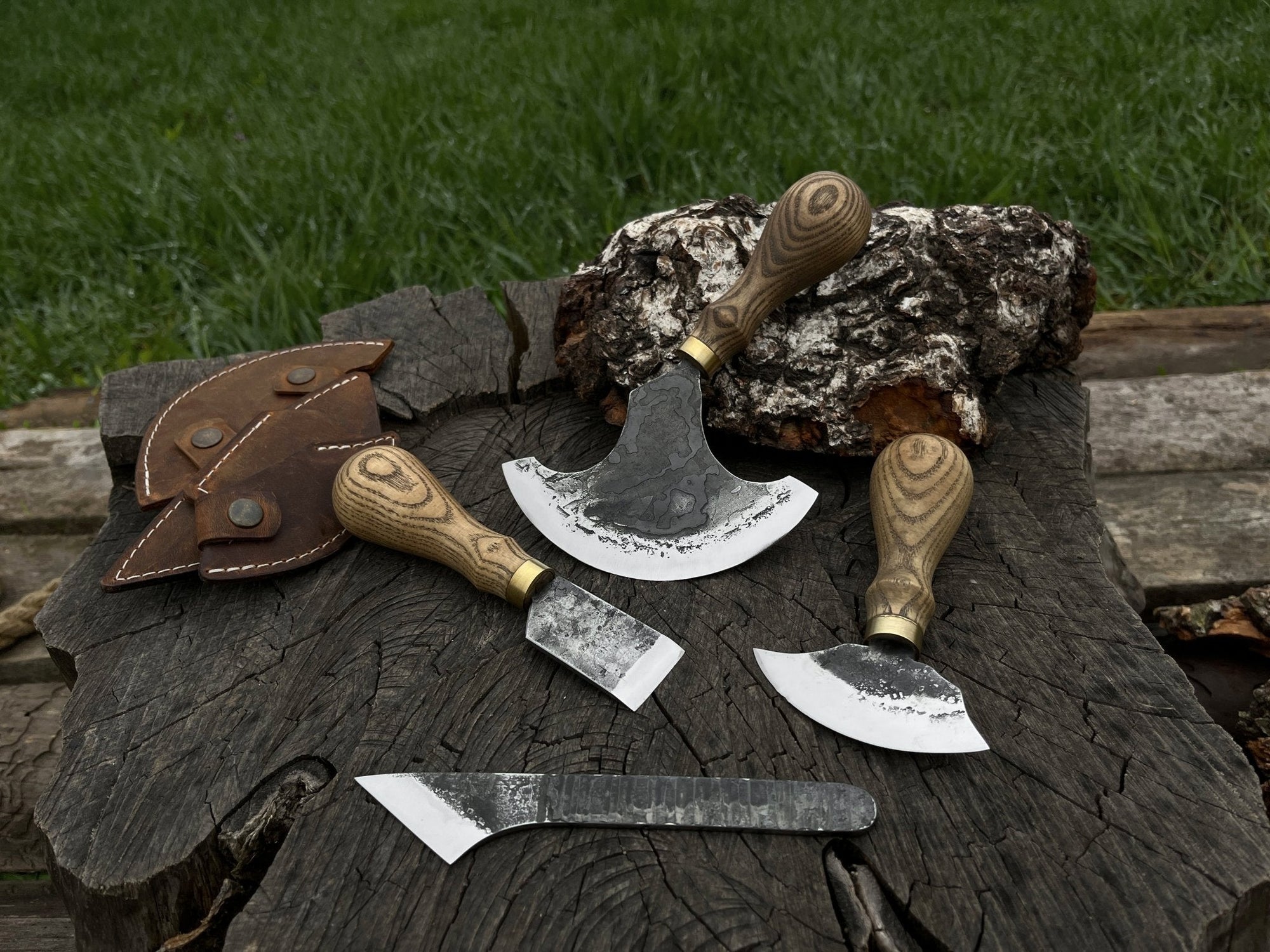 4-piece leatherworking tool set with hand-forged carbon steel blades and ash wood handles