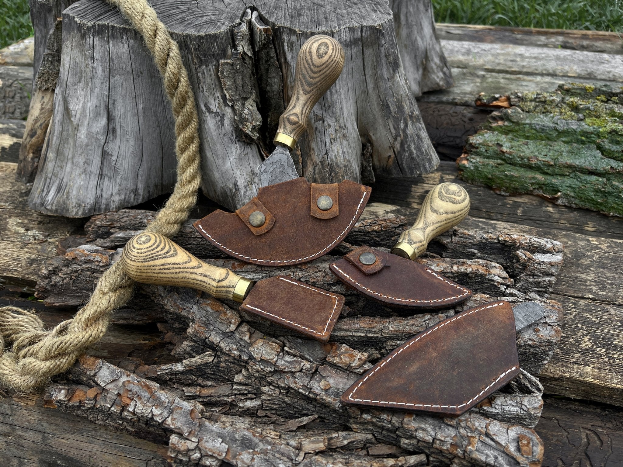 4-piece leatherworking tool set with hand-forged carbon steel blades and ash wood handles