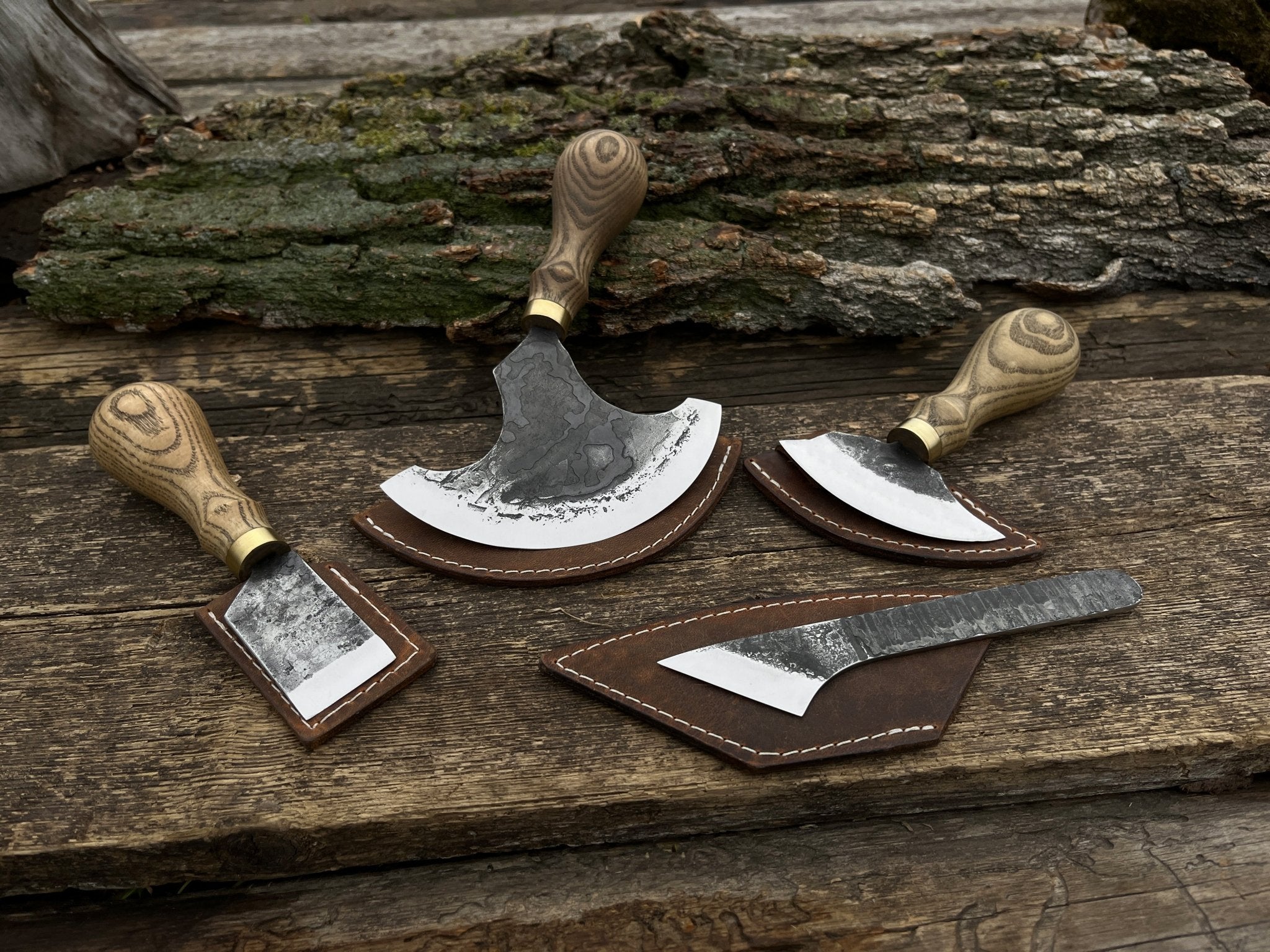 4-piece leatherworking tool set with hand-forged carbon steel blades and ash wood handles