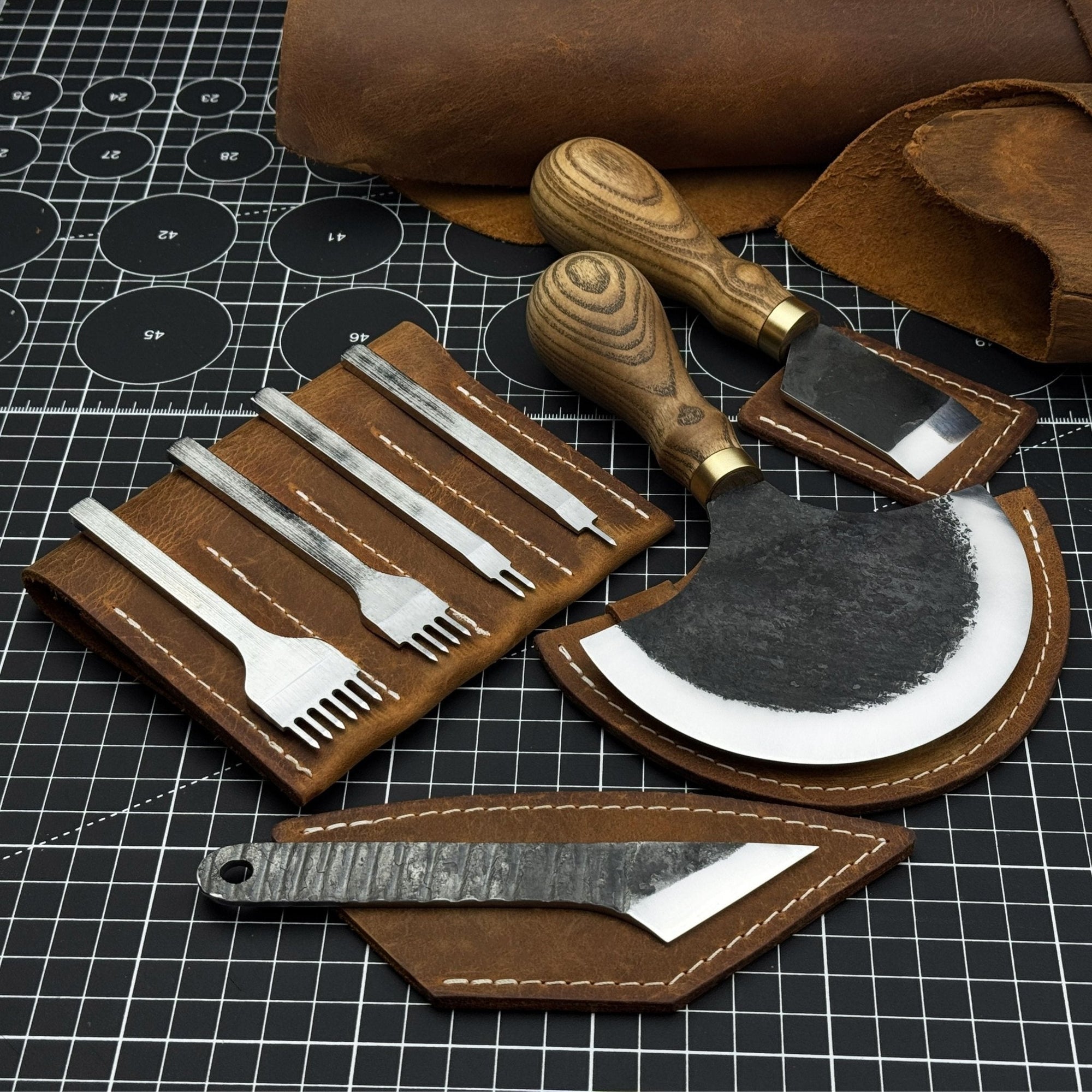 4-piece leatherworking tool set with leather sheaths by Sharky Forged Steel Tools