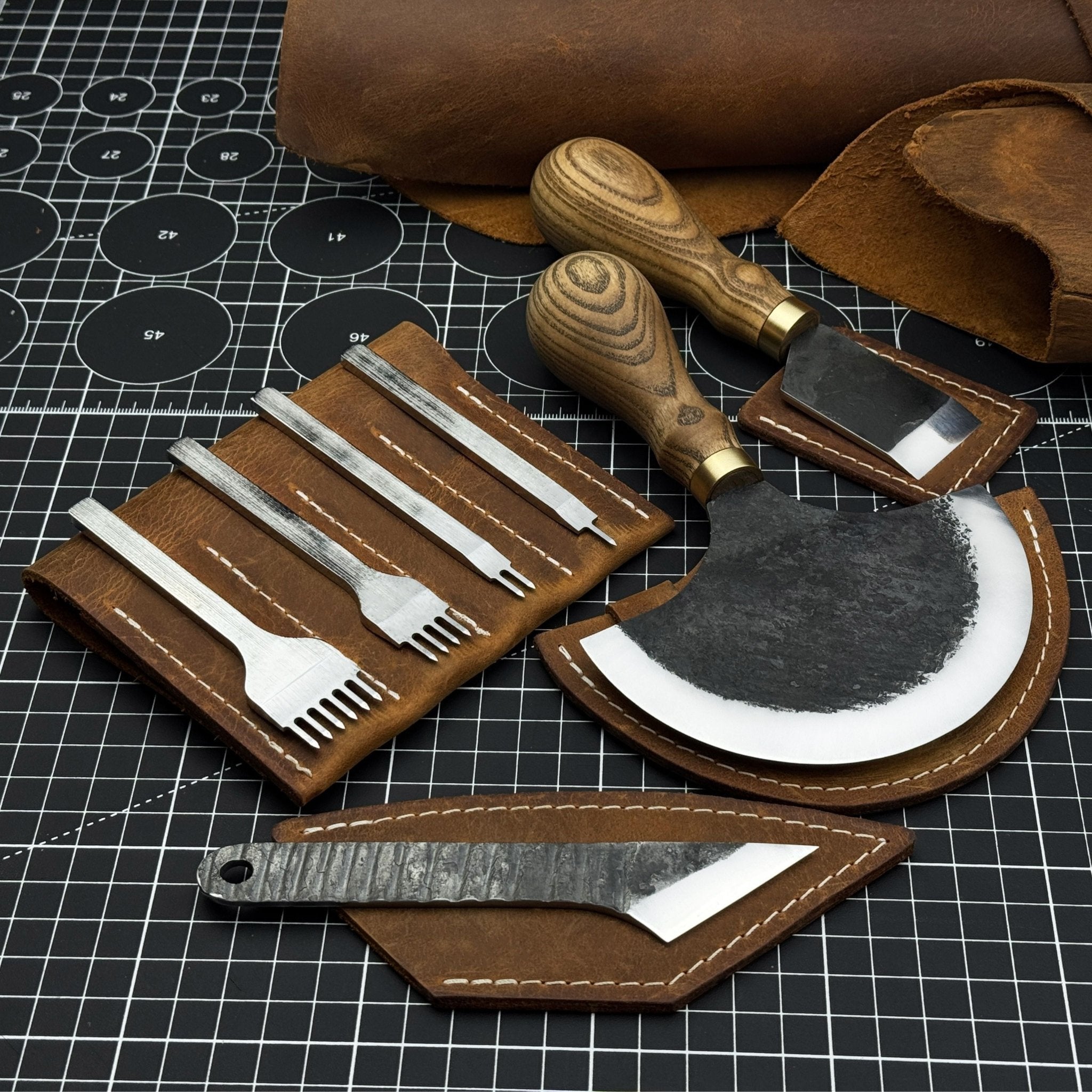 4-piece leatherworking tool set with leather sheaths by Sharky Forged Steel Tools