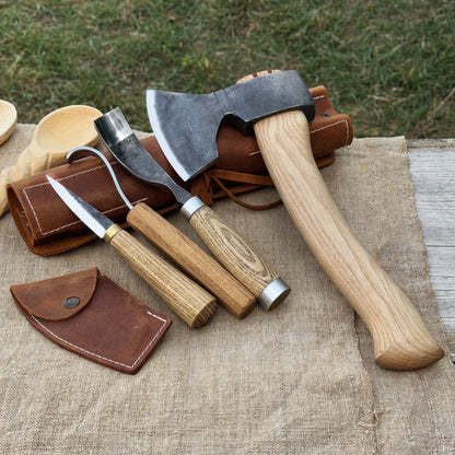 4-Piece Spoon Carving Tool Set with carving axe, sloyd knife, hook knife, bent gouge, and leather roll