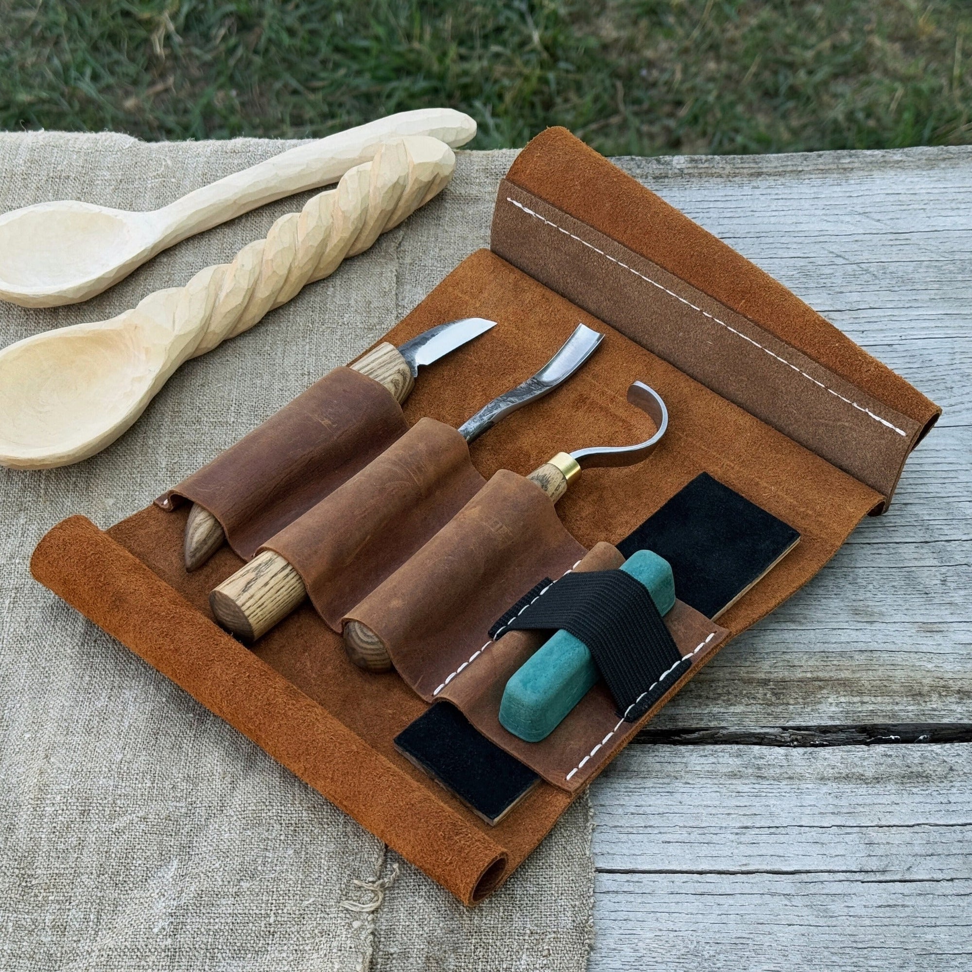4-piece spoon carving tool set with sharpening board and leather case by Sharky Forged Steel Tools