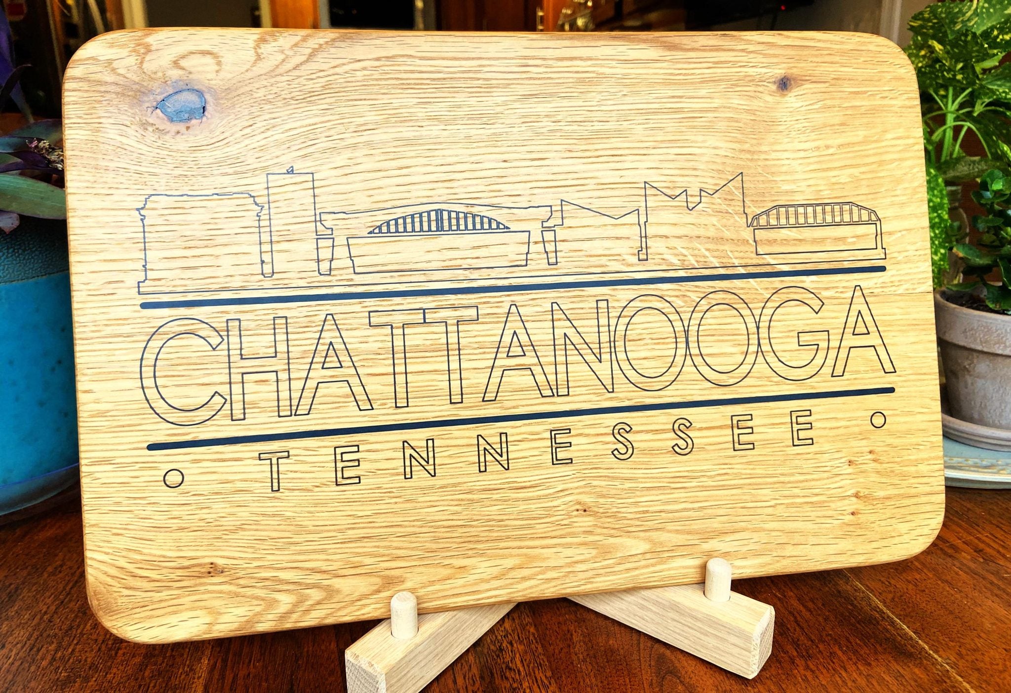 Handmade white oak charcuterie board with engraved Chattanooga skyline