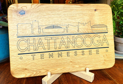 Handmade white oak charcuterie board with engraved Chattanooga skyline