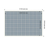 Rectangular light blue fabric pinboard with white grid lines showing 36x24 inch inner size within a 37x25 inch white frame, viewed from above.
