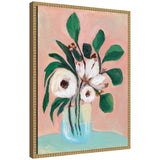 Framed canvas painting of white flowers with dark centers and green leaves in a blue vase against a soft pink background, bordered by a beaded gold frame.